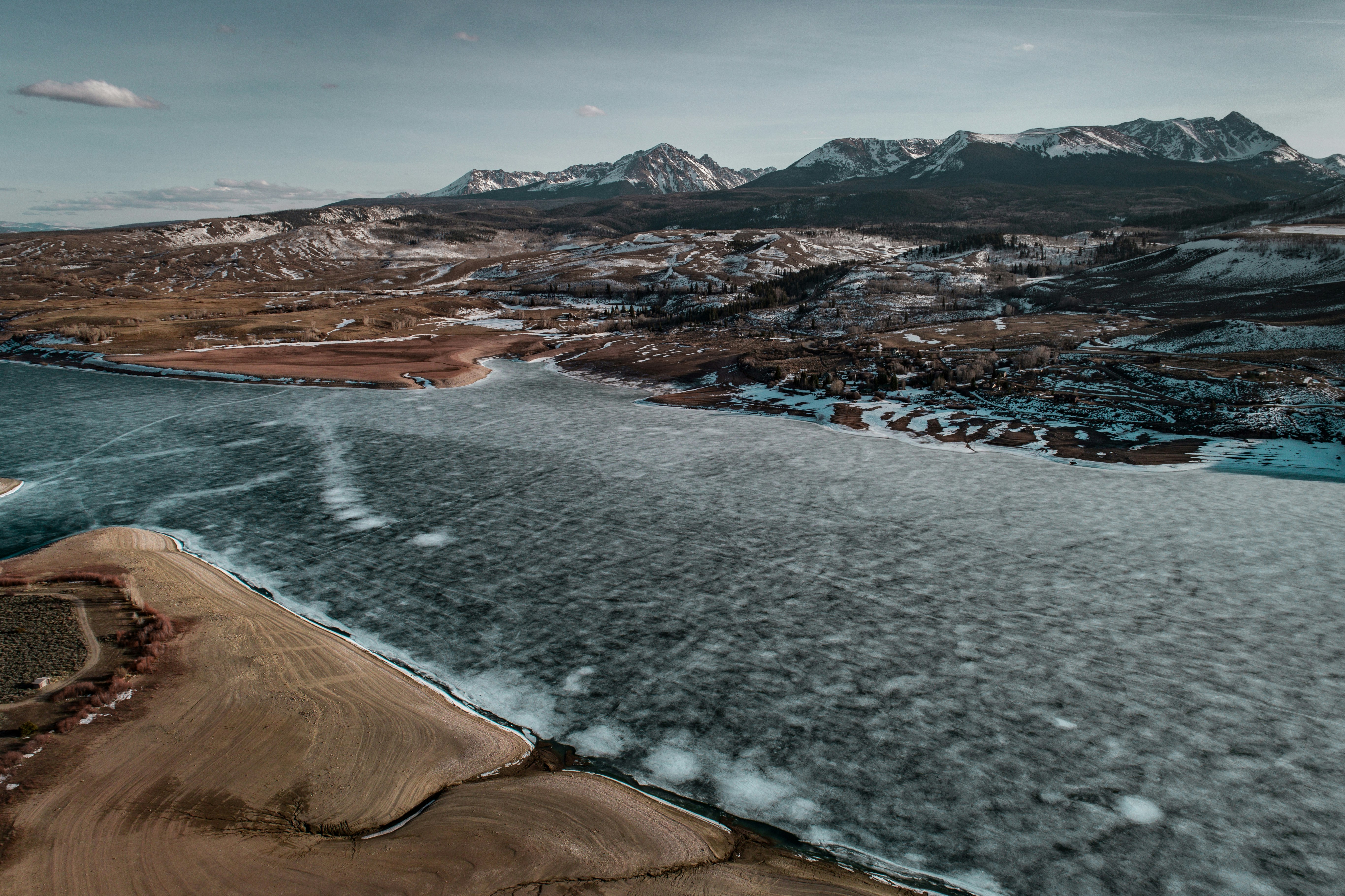 aerial photography of river near mountain